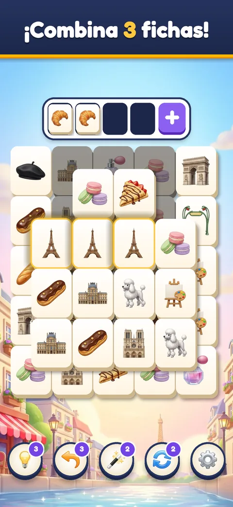 Mahjong tile match board in Trip Sort: layered Paris tiles with Eiffel Tower tiles in the tray, in Spanish